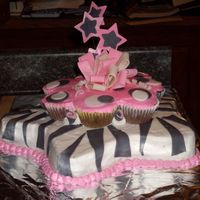 Zebra Star Cake With Cupcake Cake On Top 