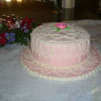 Lace Cake This cake is covered with fondant and decorated with royal icing.