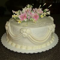Anniversary Cake Covered in fondant with sugar flowers