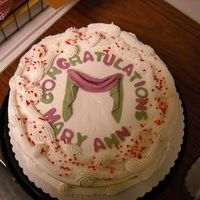 Swag And Cascade Retirement Cake This was made for a Decorator at JCPenney's Fondant accents on buttercream