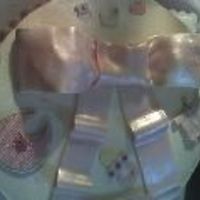 Baby Girl Shower This cake was done for a baby shower for a girl. The cake is one layer chocolate with chocolate buttercream in the middle, and the top...