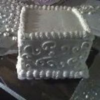 Top Layer Of Three This is the top layer of the wedding cake I posted before. I'm waiting for copies of the pics with all the layers together. This is...