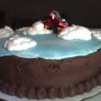 Wild Blue Yonder This is a cake for a pilot, chocolate cake w/chocolate buttercream. Top of cake is a piece of fondant - I mixed the sky blue and white to...