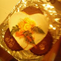 Completed Wedding Cake The wedding cake is finished. It has 3 six inch rounds under the heart. This cake was made completely from scratch from a recipe the groom...