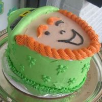 Side Of Leprechaun Cake Side view. I tried to do shamrocks on the side, with a leaf border.