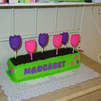Tulip Birthday This was for my daughters sixth birthday. The tulips were molded chocolate, the dirt was crushed Oreos. She LOVED it!