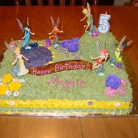 Tinkerbell And Fairies This was for my daughter's fifth birthday. She saw a similar cake on this site, and LOVED it, and insisted that was what she wanted. I...
