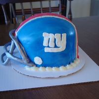 Giants Football Helmet My first attempt at a helmet cake! Thanks for all the inspiration from CCers! It came out pretty good! 2 8 inch rounds, topped with the...