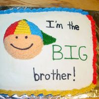 Big Brother Cake Cake was 1/2 vanilla, 1/2 chocolate with BC icing. Cake was designed to match a sweater that the big brother was wearing for his big...
