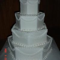 Hexagon Swag Cake dummy for upcoming bridal show. Hexagon with zigzag swags.