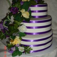 Triple Purple Stripe With Flowers Another version of the triple stripe cake dummy. Used a flower swag from Walmart and worked perfectly!