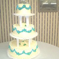 Heart Wedding Three tier heart, yellow cake with bc. Had a lot of fun with this cake because my sister helped a lot and we got to spend time together:)