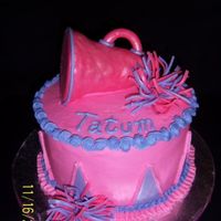 Cheerleader I had a request for a cheerleader cake and this is what I came up with. It's a 8" round with bavarian cream filling. Iced in BC...