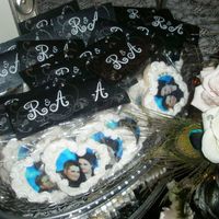 Photo Cookies I made 250 of these photo cookies for thank-you gifts for the guests. I created the monogram toppers as well. Many many hours to create but...
