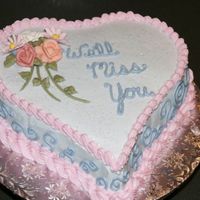 We'll Miss You Miss Baxter Chocolate cake iced w/BC. Flowers are royal icing.