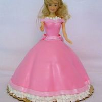 Pretty In Pink Princess So, I tried one of the Wilton doll dress pans and did not like it at all! But, I had a princess cake for a little girl's birthday to...