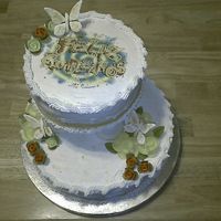 Image_156.jpg Both layers made with white cake buttercream edible image on top says Happy Birthday in Spanish ... Roses are made out of waffers and...