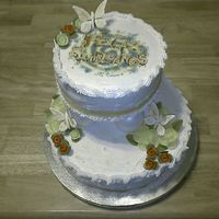 Image_155.jpg Both layers made with white cake buttercream edible image on top says Happy Birthday in Spanish ... Roses are made out of waffers and...