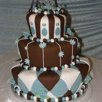 Contemporary Wedding Cake 3 tiers, 9 layers. Fondant and buttercream.