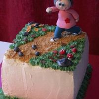 Autumncake With Lady Playing Boule A high chocolate and heavy cream cake with rasbeerrymousse filling.