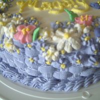 Purple Pinky Cake A basquet cake with diferents flowers