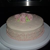 Final Class 1 Wilton 1 Cake I had trouble with my filling bulging out of the sides of my cake, also had trouble getting my icing nice and flawless!!