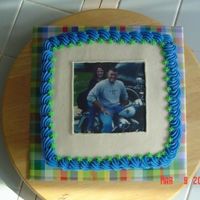 Square Photo Cake This is White DH mix with extender recipe added, frosted in buttercream. The photo is an edible image from the customer. Her husband is in...