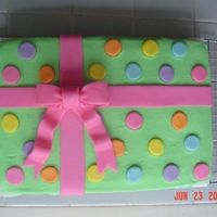 Another Gift Box This is yellow cake w/extender added. All buttercream with MMF accents.