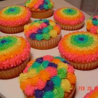 Rainbow Cupcakes These are yellow cupcakes with extender recipe added and all buttercream. They are for my 2 year old's two teachers' birthdays.