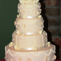 Ivory Wedding Cake This is the first cake I've really done alot of piping on. The bride was super happy and I was too.