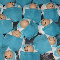 Sleeping Babies I forgot to take a picture before packing them up! DH called this my "nursery". Chocolate cupcakes w/BC, colored white chocolate...