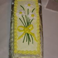 Daffodils My first attemp at royal icing flowers. The cake is a 9x13 cut into thirds and stacked.