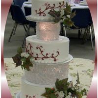 Brugandpink1.jpg White almond cake with buttercream frosting. The bride did not bring the flowers that were to be put on the cake, so I did a quick fix with...