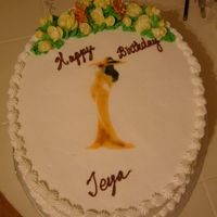 Classy_Lady.jpg Buttercream iced with fondant roses, lilies and airbrush lady.