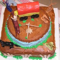 Wild Wild West 2 tier yellow with buttercream.