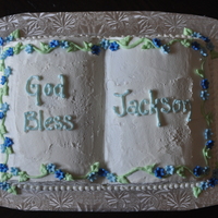 Jackson Christening the smaller wilton book cake pan, buttercream icing and fondant flowers.