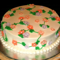 Coral And Purple Floral Birthday Cake 10x4 in cake with Buttercream, fondant flowers. Raspberry Lemonade cake with raspberry mousse filling. My friend loves these flowers and...