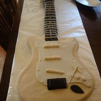 Life Size Fender Electric Guitar Used a real guitar as the template, used a 12 X 18 cake pan to make the body, the neck I used a 9 X 13 cake and cut to size