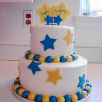 Blue & Gold Cake for my father-in-law's birthday. BC with MMF decorations.