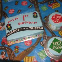 Marcos And Tristan First Birthday Cake Two friends sharing a first birthday party. Buttercream icing with fondant accents. Tried to make it to compliment the tablecloth. Two...