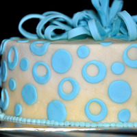 Blue Bow Cake Moist Marbled cake with butter icing & fondant accents. Thank you for looking.