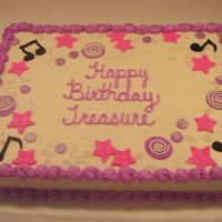 Hip Hop Birthday Cake Musical notes, stars and circles made from Fondant. You can't tell in the picture, but I put some "sugar rocks" on the cake...