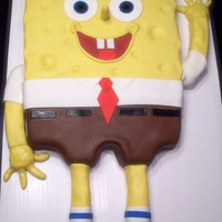 Spongebob Square Pants Spongebob cake, covered in fondant. Legs and arms made from rice treats covered with fondant.