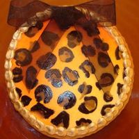 Leopard Cookies Cookie order for hand painted leopard cookies. These were airbrushed first yellow/orange then hand painted. Trim is painted with edible...