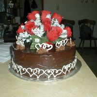 Wedding Cake This was a cake for approximately 20 people. It is what my family and friends call my chocolate heaven cake covered in chocolate ganache...