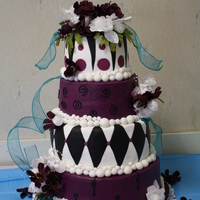 Alice In Wonderland Wedding Cake I made this cake for an Alice in Wonderland themed wedding. It's my first cake over 3 tiers...and my first time using SPS! Wedding...