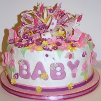 Butterflies And Ladybugs Baby Shower Cake I did this for a friend's baby shower. It was butterflies and ladybugs themed. Cake iced in buttercream. All fondant and gumpaste...