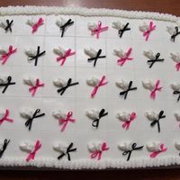 Rose Buds And Bows The Bride wanted a simple cake for her shower with guide lines for cake squares. I incorporated her wedding colors by adding satin bows to...