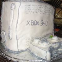 Xbox 360 With Wireless Remote. My 13 year old wanted this replica of his favorite game console. Fondant and buttercream. Was a great hit!