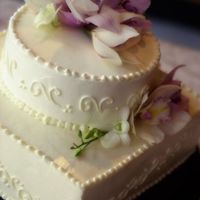 American Elegance My inspiration for this cake were the the bride and groom to be, wanting a Simple and elegant American wedding cake.This Two tiered Four...